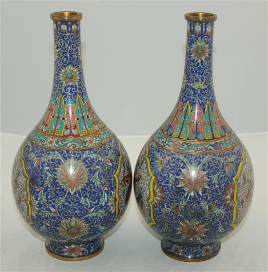 A pair of Chinese cloisonne enamel dragon bottle vases, early 20th century, 25.5cm